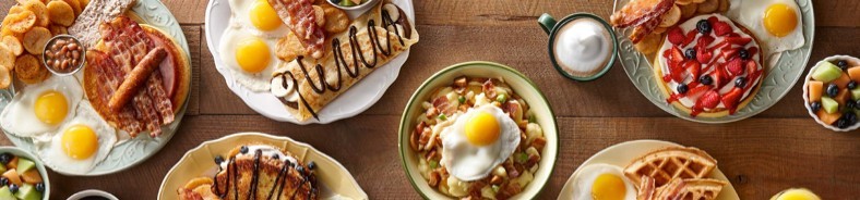 Combo eggs served with a crispy blueberry and cream cheese french toast sandwich